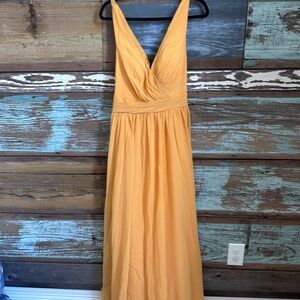 Pair of marigold azazie bridesmaid dresses